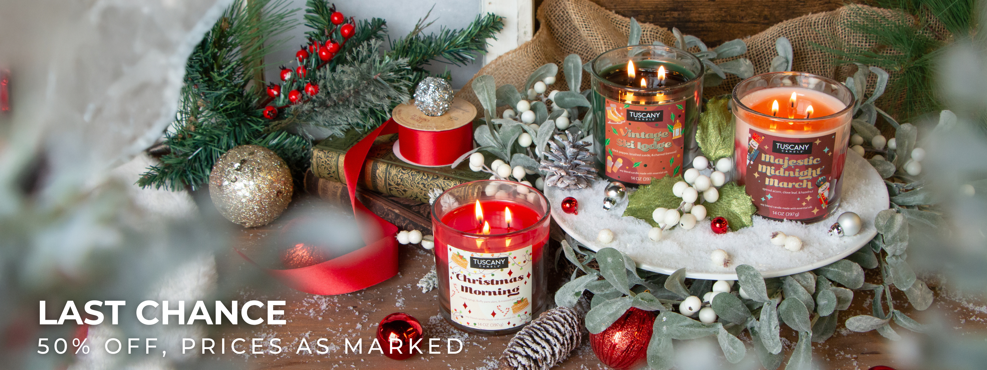 A cozy scene with a chair, a yellow pillow, a round table holding a lit candle, a pumpkin mug, two orange candles, and decorative pumpkins.