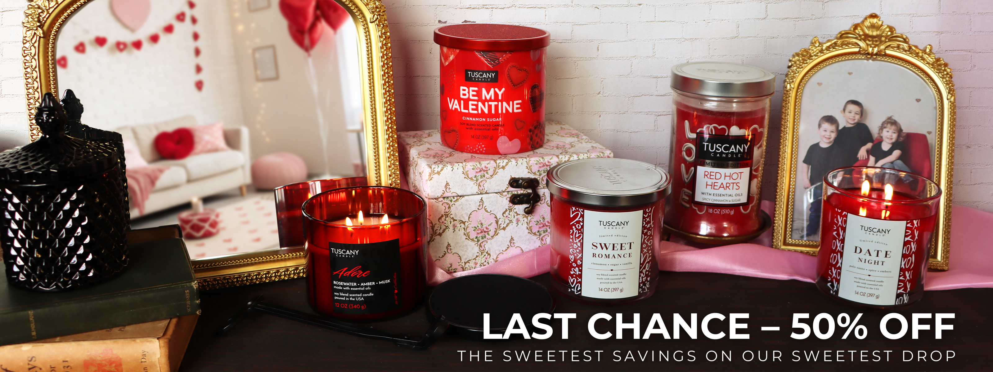 A cozy scene with a chair, a yellow pillow, a round table holding a lit candle, a pumpkin mug, two orange candles, and decorative pumpkins.