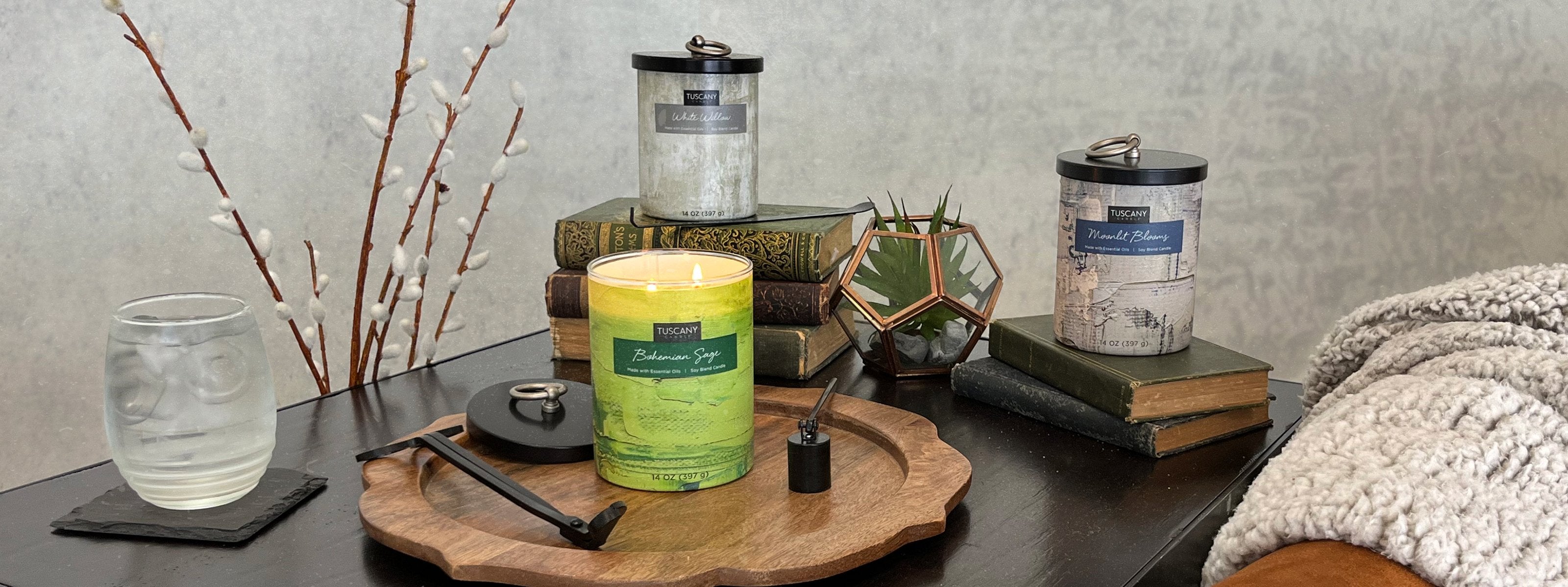 Home Décor collection displayed with flowers, gourds, and tea on a living room table.
