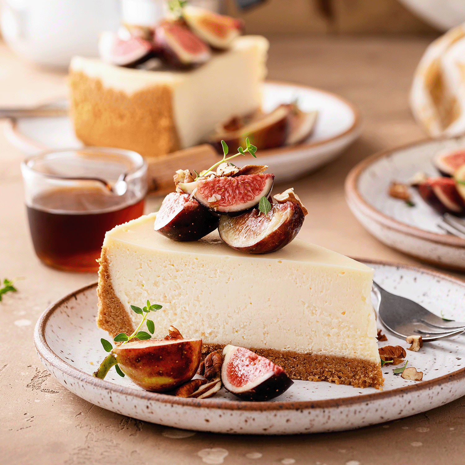 A slice of cheesecake with figs and herbs evokes the cozy fall aroma of Tuscany Candle® SEASONAL’s Pumpkin Cheesecake: Vanilla & Roasted Cinnamon Scented Fall Wax Melt (2.5 oz).