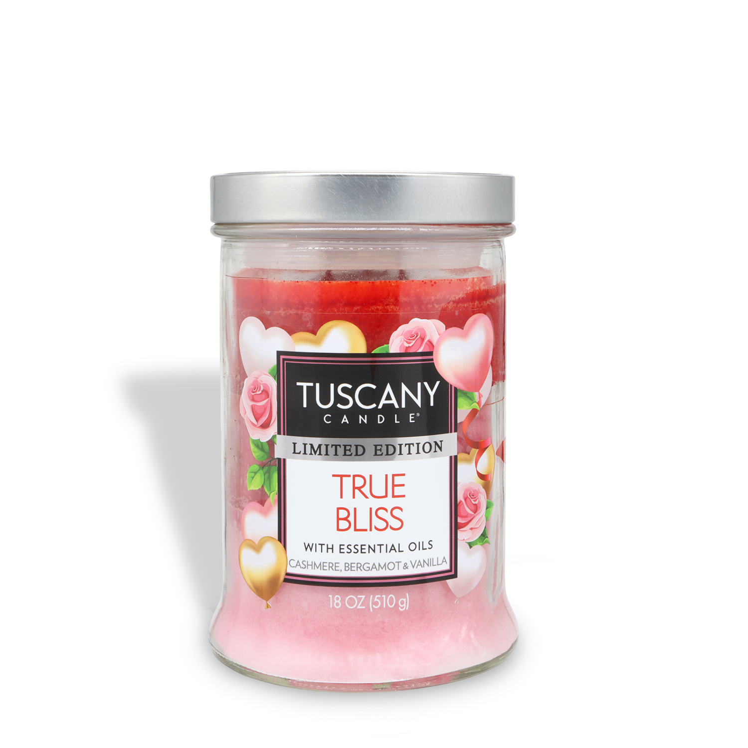 An 18 oz pink Tuscany Candle® SEASONAL True Bliss: Cashmere & Vanilla Scented Valentine's Candle, limited edition with essential oils, in a glass jar labeled with hearts and roses.