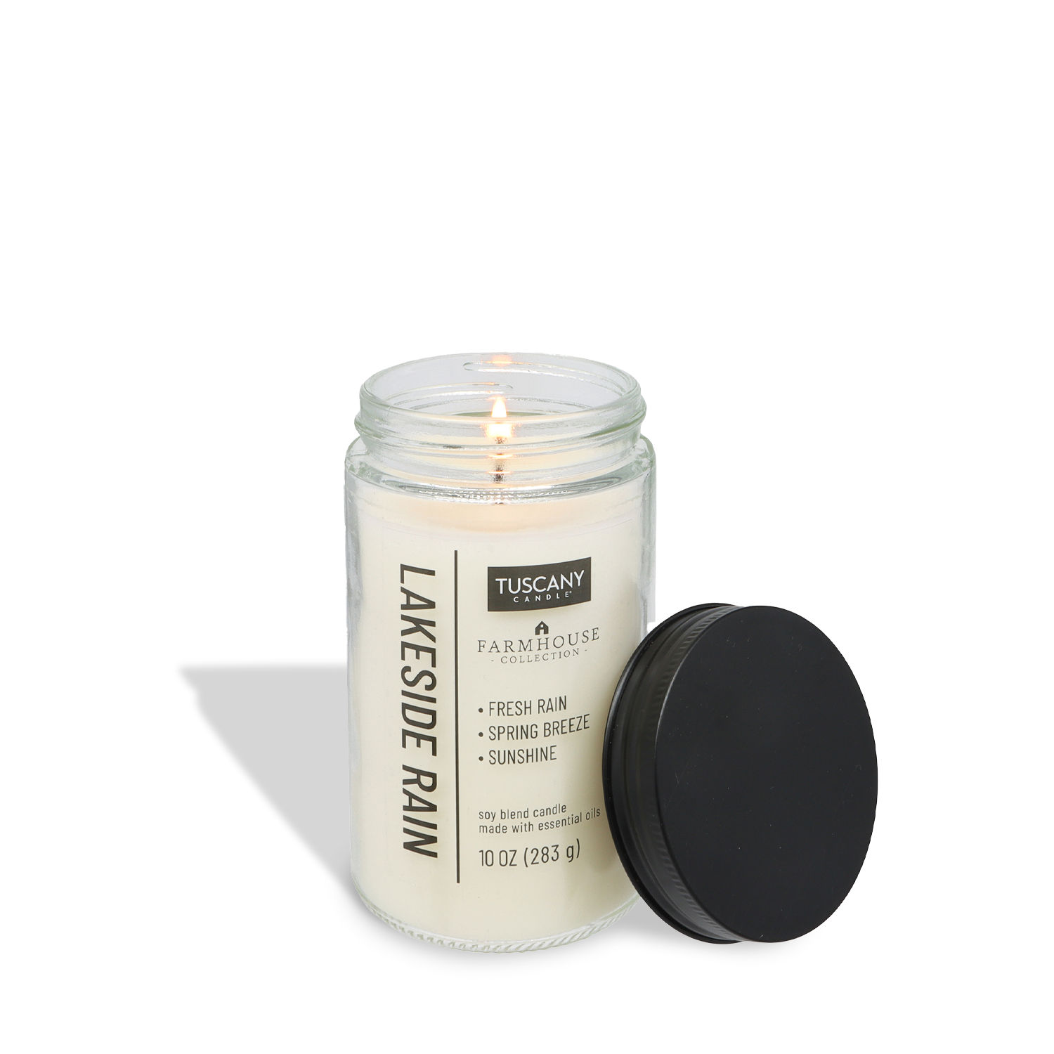 The Tuscany Candle® EVD Lakeside Rain Scented Jar Candle (10 oz) from the Farmhouse Collection in a clear glass jar with black lid adds refreshing charm to your decor.