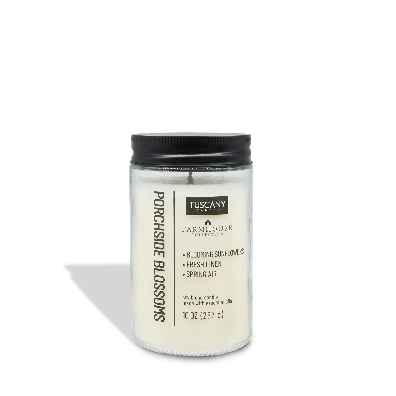 The Porchside Blossoms Scented Jar Candle (10 oz) from Tuscany Candle® EVD’s Farmhouse Collection features blooming sunflower, fresh linen, and spring air scents in a white jar with black lid for a charming farmhouse touch.