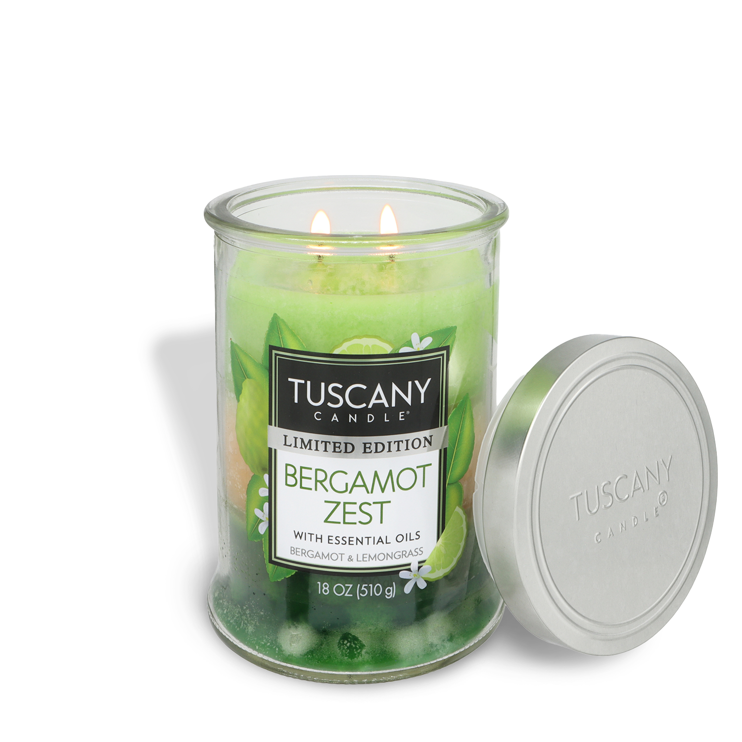 A Tuscany Candle® SEASONAL Bergamot Zest: Lemongrass Scented Spring Candle (18 oz) with two lit wicks sits by its silver lid, displaying a lemon and leaf design. Crafted with essential oils, it fills your space with a refreshing spring aroma.