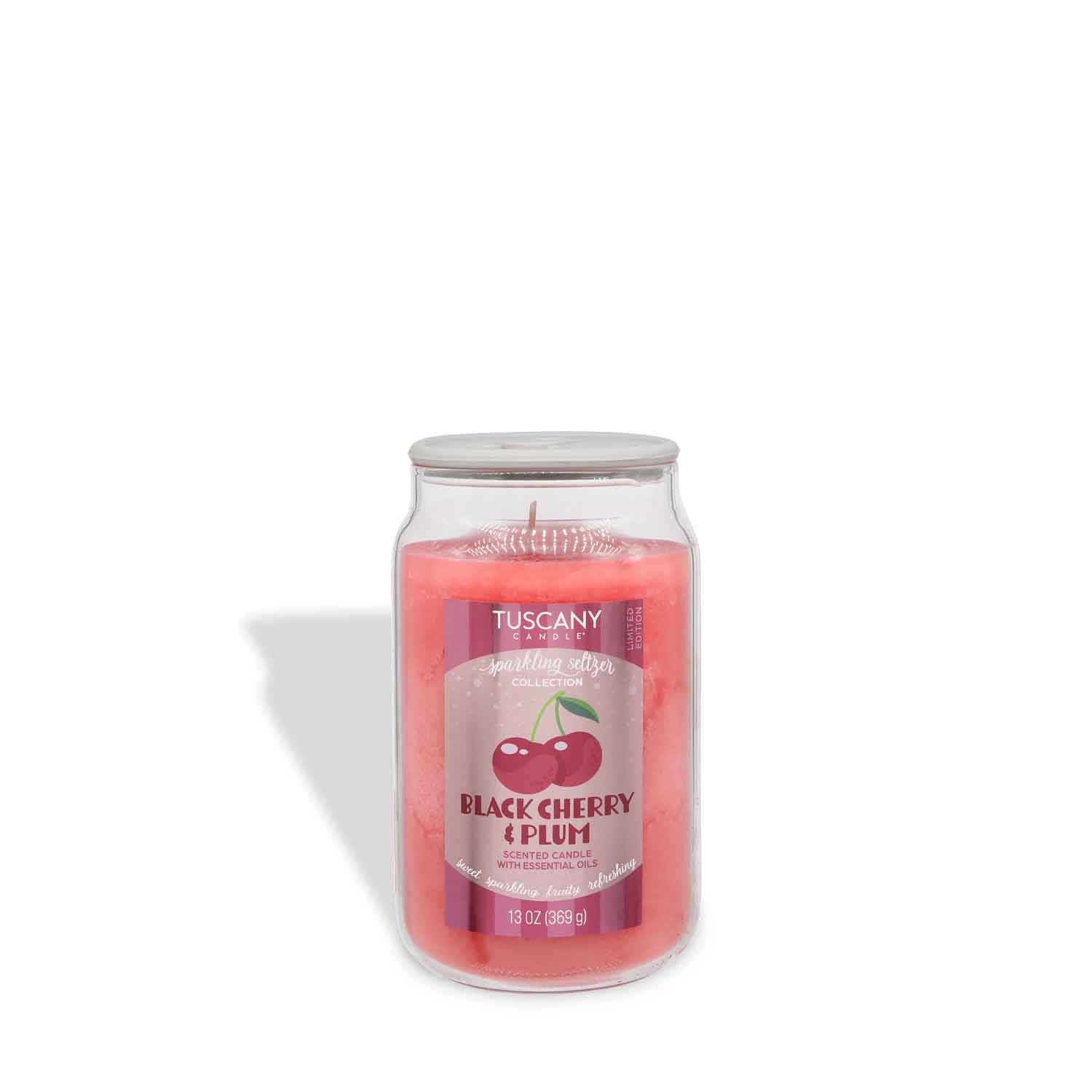 A 13 oz Tuscany Candle® SEASONAL Black Cherry & Plum: Sparkling Seltzer Scented Summer Candle with pink wax in a clear glass jar.