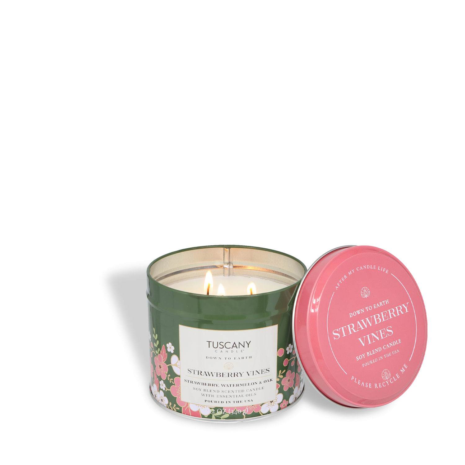 A green tin candle labeled "Strawberry Vines: Watermelon & Oak" from Tuscany Candle® SEASONAL's Down to Earth Collection, 12 oz, features floral designs, a pink lid beside it, and two lit wicks for a fresh spring scent.