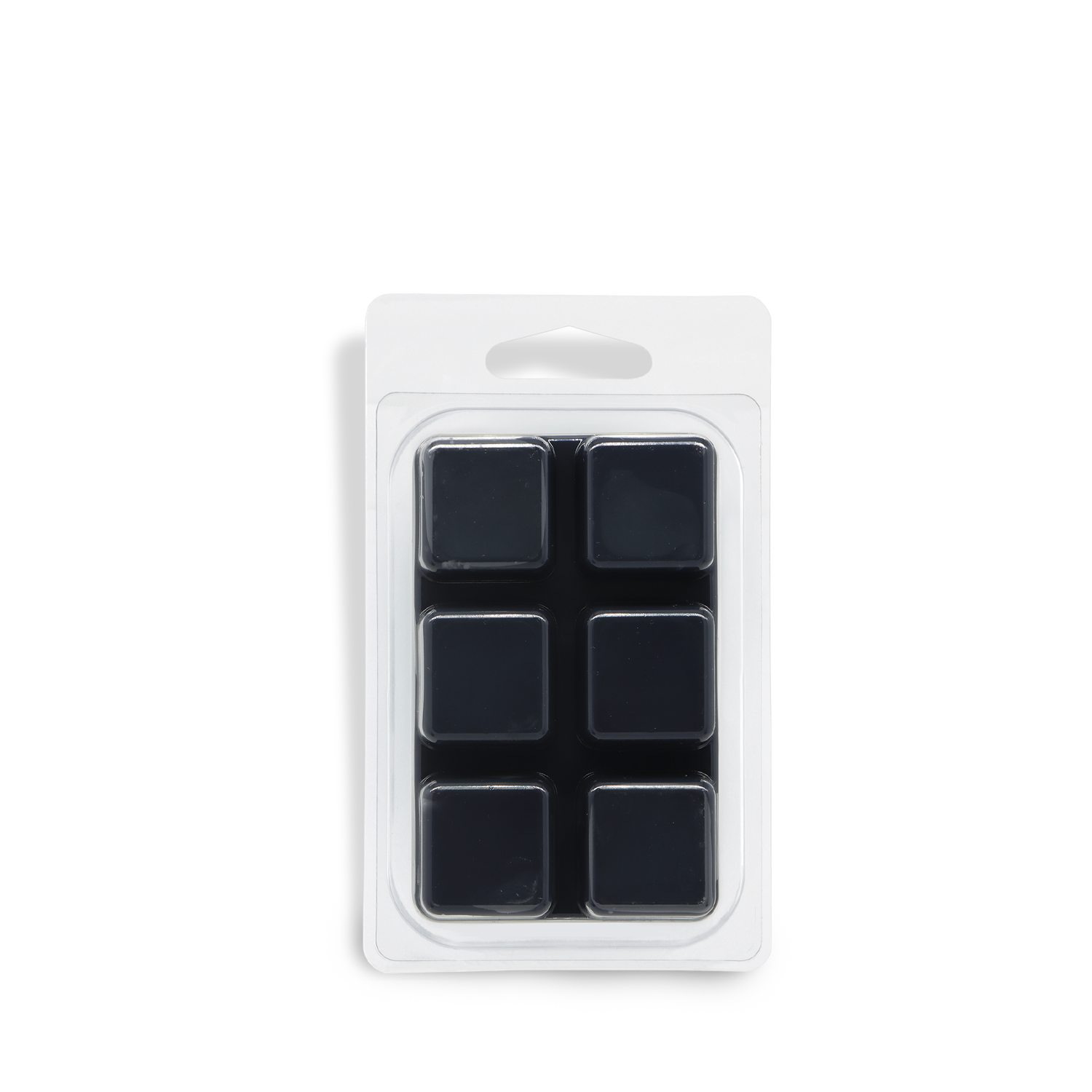 A blister pack of Tuscany Candle® SEASONAL Spooky Soda: Pumpkin & Cream Soda Scented Halloween Wax Melt (2.5 oz), featuring six black square wax melts arranged in two rows of three, displayed against a white background.