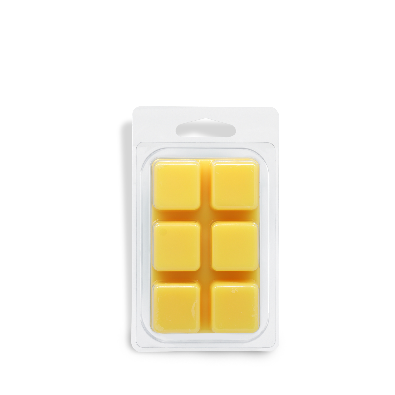 A plastic clamshell package containing six yellow wax cubes, arranged in two rows of three, displays the Tuscany Candle® SEASONAL Monster Bites: Caramel Kettlecorn Scented Halloween Candle Wax Melt (2.5 oz) on a white background.