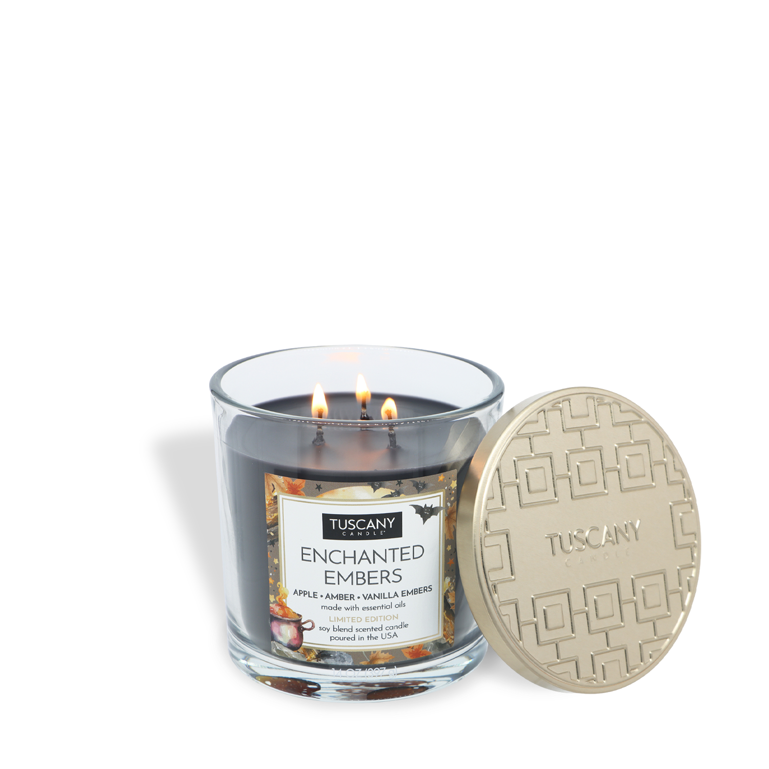 A black Tuscany Candle® SEASONAL “Enchanted Embers: Apple & Amber Scented Halloween Candle” (14 oz) with three wicks and an open gold lid placed next to it.