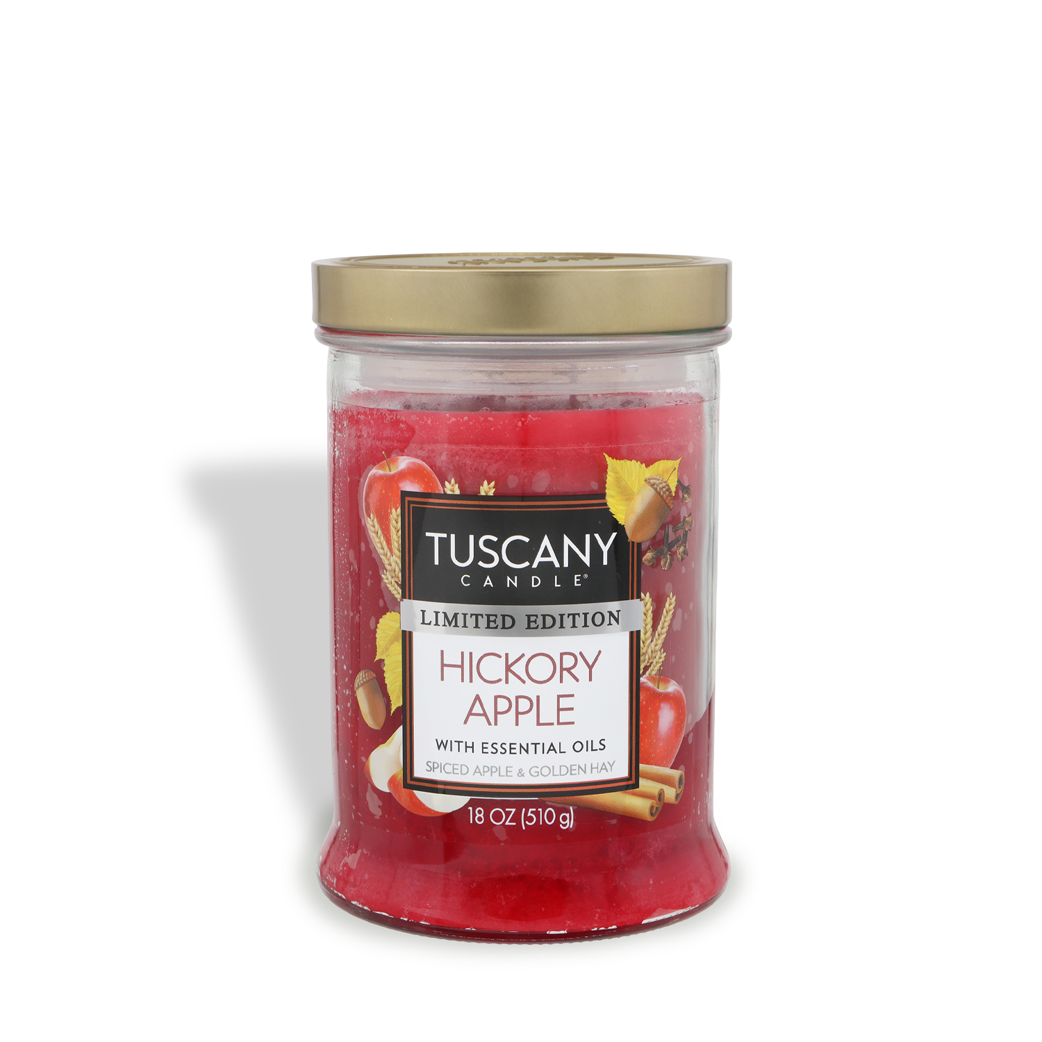 The Tuscany Candle® SEASONAL Hickory Apple: Spiced Apple & Golden Hay scented fall candle (18 oz) features essential oils and a front label with apples, cinnamon sticks, and hay; it's a limited edition.