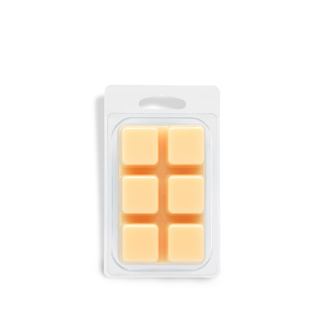 A rectangular plastic package containing six light orange Yuletide Vanilla: Smooth Rum & Clove Scented Holiday Wax Melt (2.5 oz) cubes.