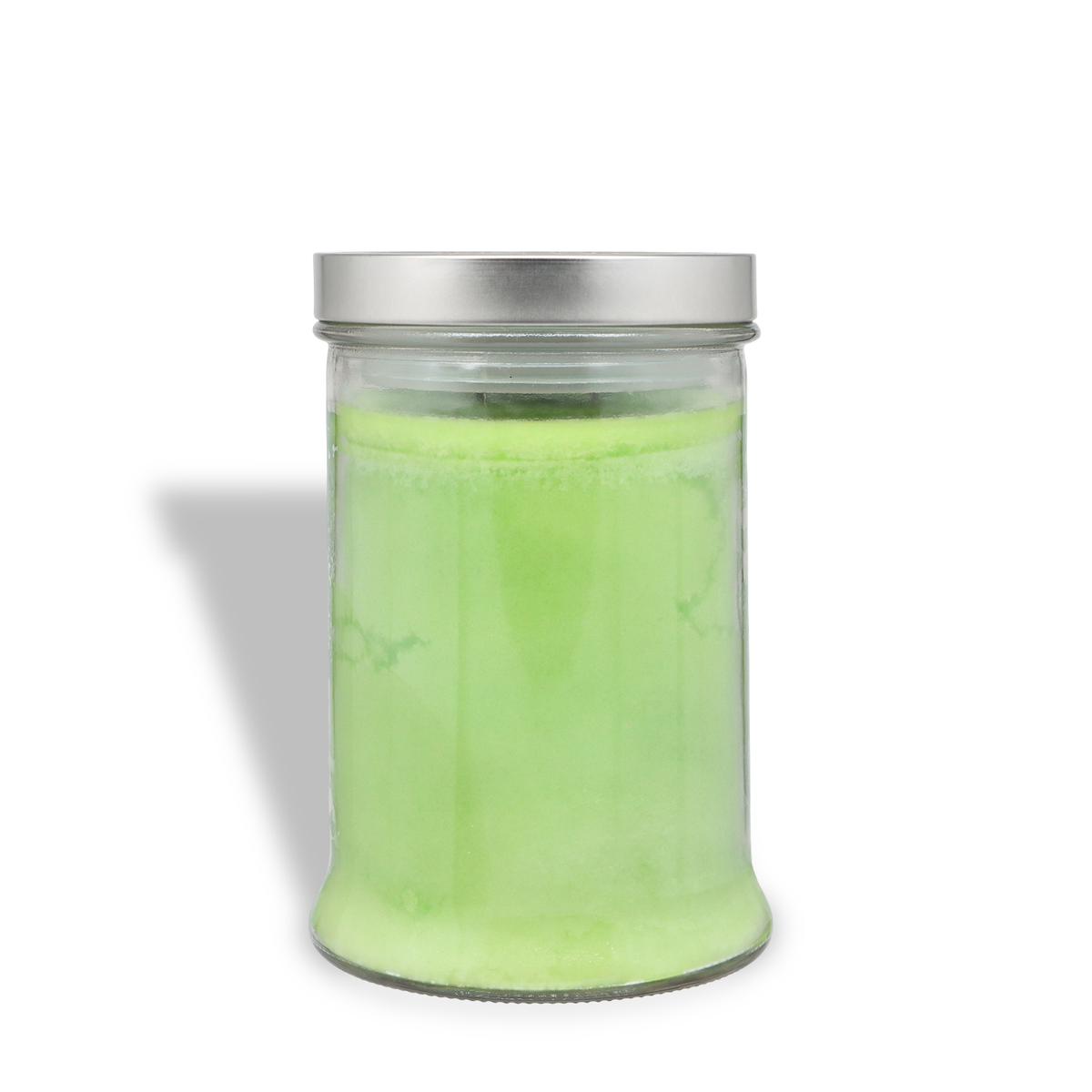 A Winter Pear: Golden Pear & Vanilla Scented Holiday Candle (18 oz) in a glass jar with light green wax and a silver metal lid.