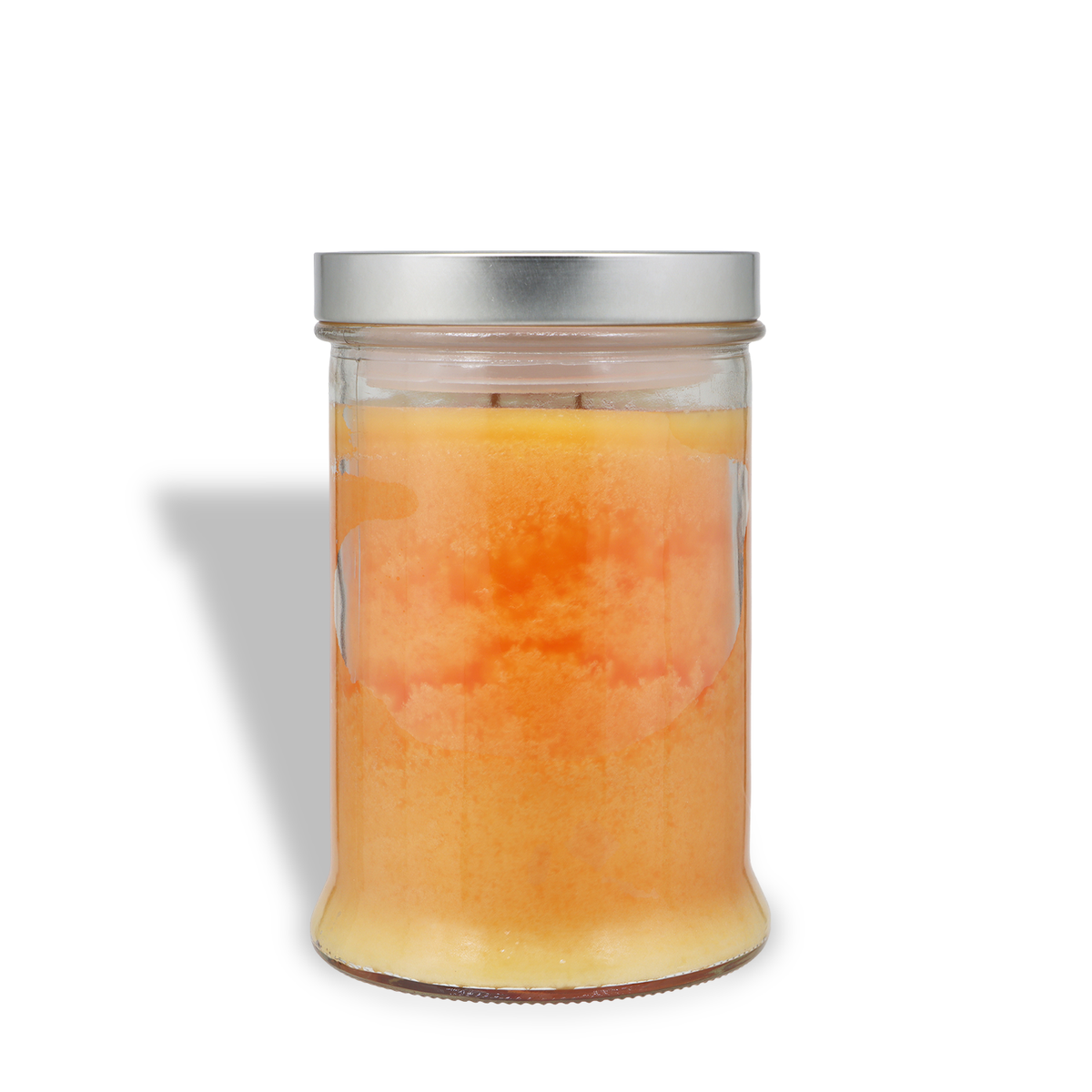 An orange Christmas Cookies: Cinnamon Spice & Vanilla Scented Holiday Candle (18 oz) in a glass jar with a silver lid.