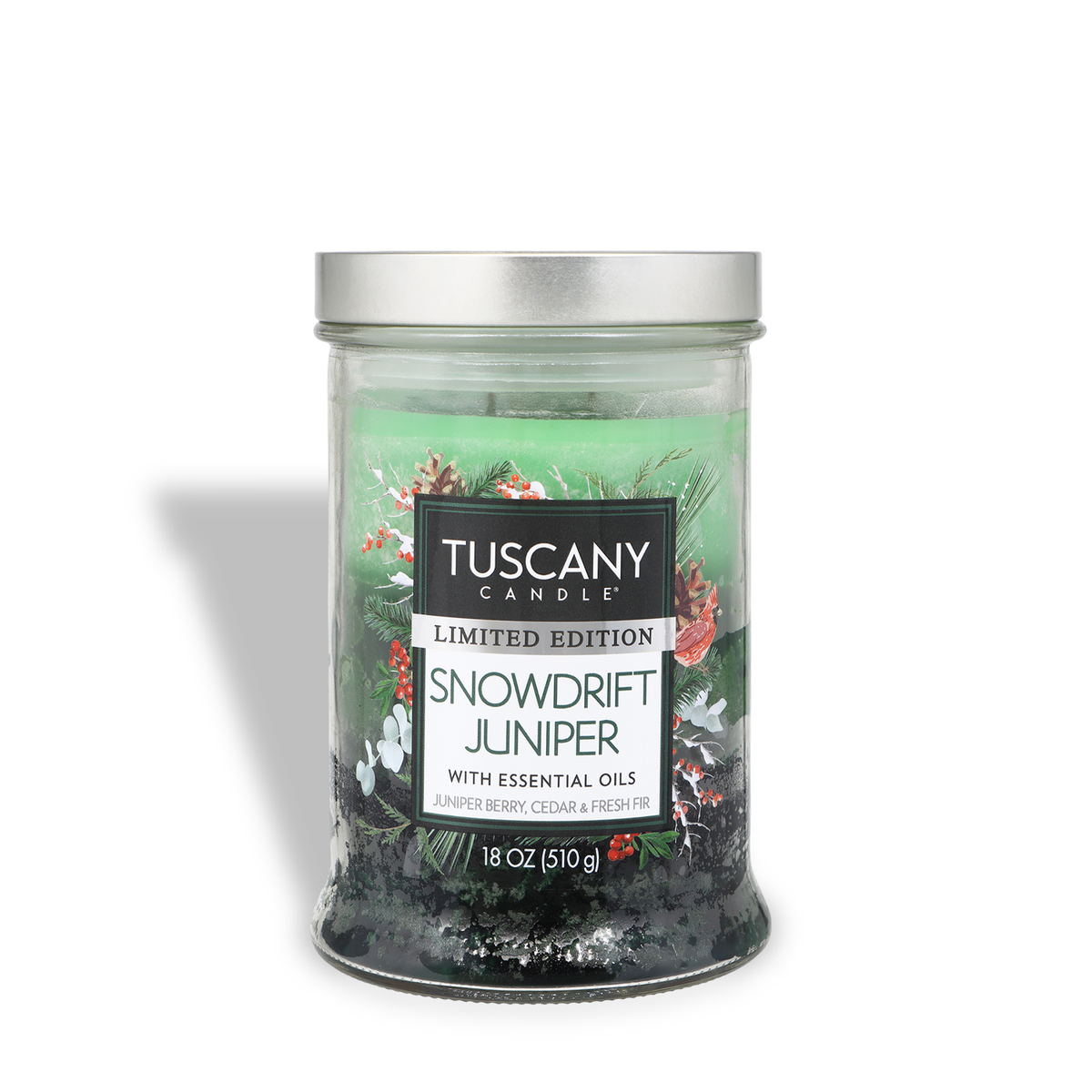 Green Tuscany Candle® SEASONAL Snowdrift Juniper: Juniper Berry & Fresh Pine Scented Holiday Candle (18 oz) in a jar with a silver lid, featuring a label of winter greenery, berries, and pinecones.