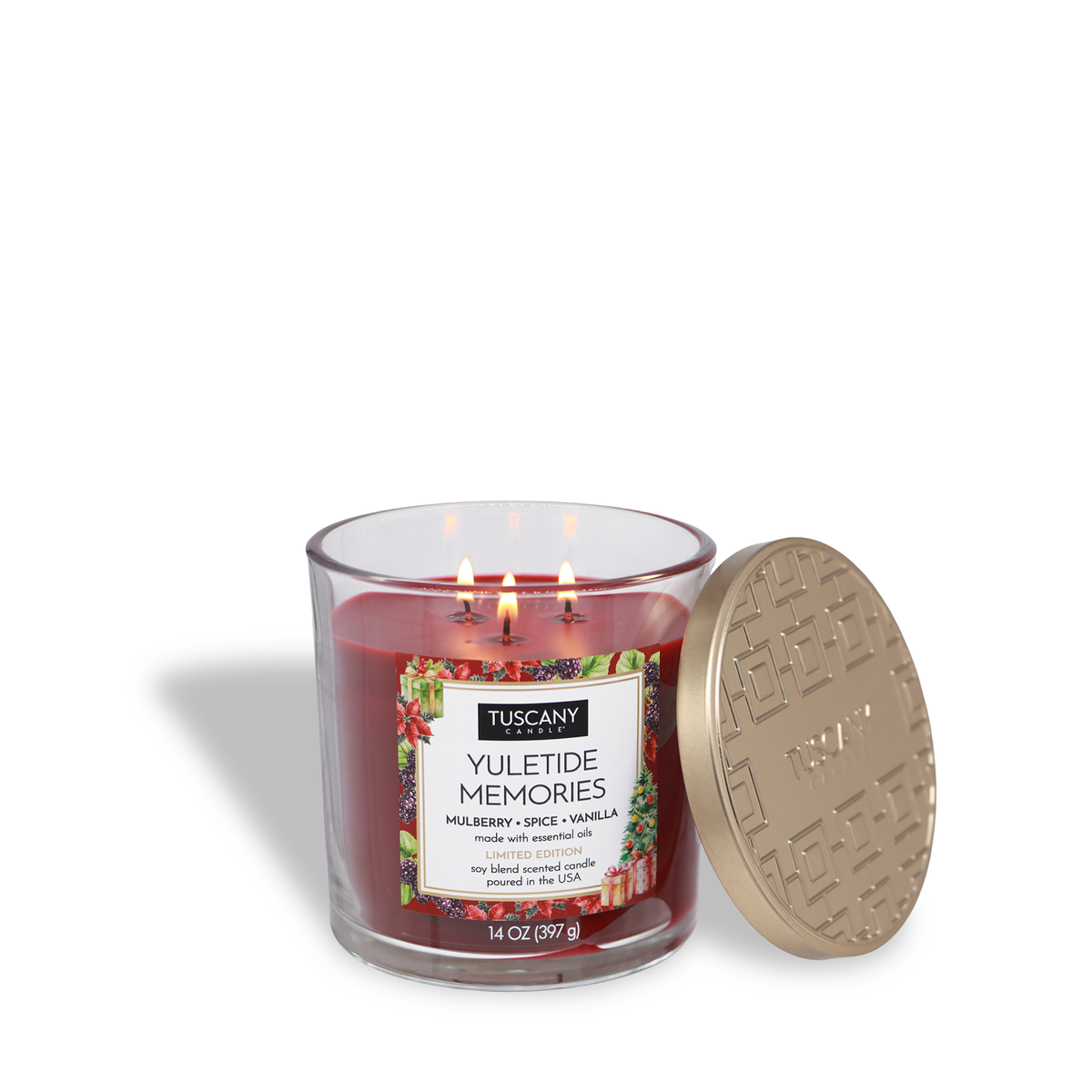 A red three-wick Tuscany Candle® SEASONAL Yuletide Memories: Mulberry & Spice Scented Holiday Candle (14 oz) in a clear glass jar with a gold-toned metal lid resting beside it.