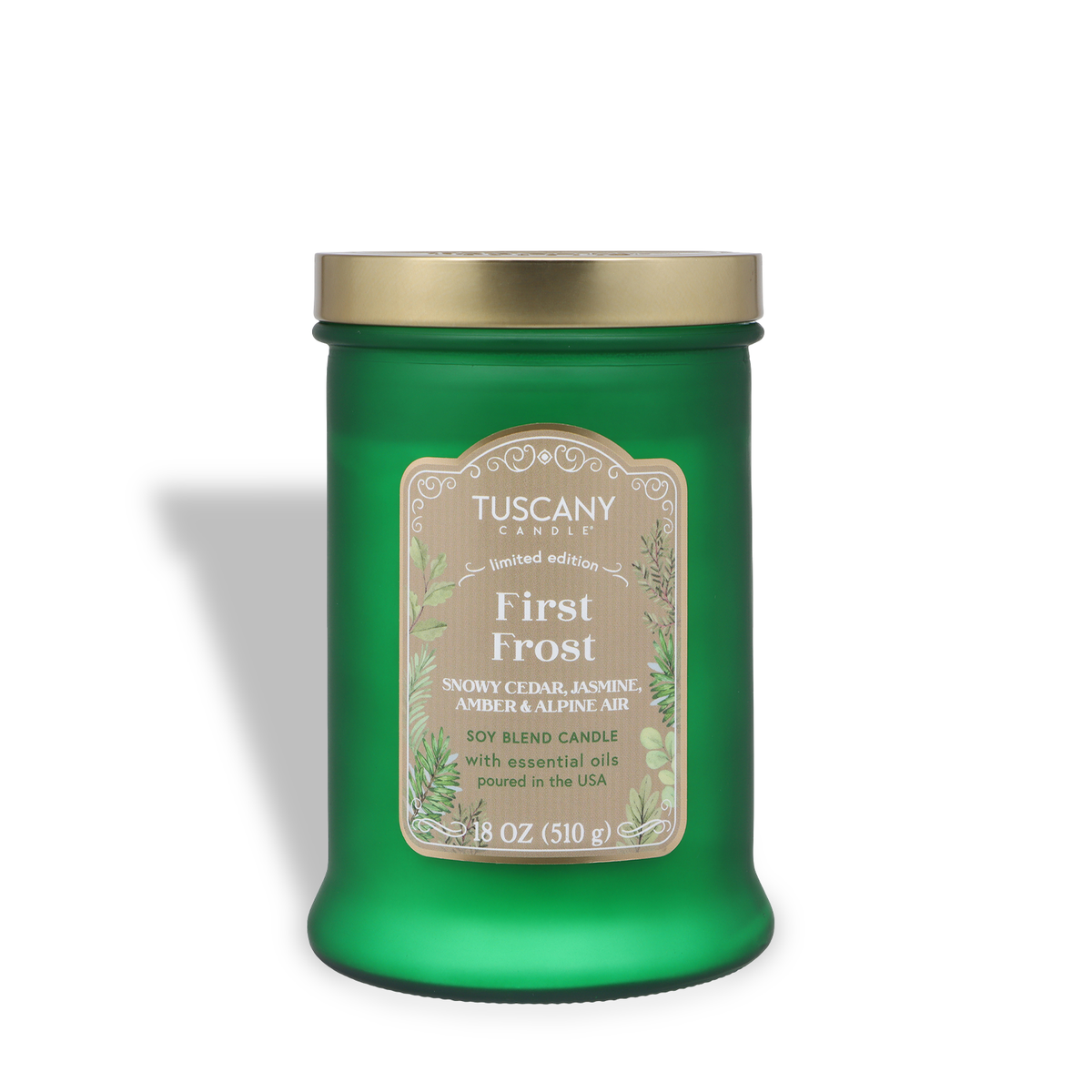 First Frost: Jasmine & Cedar Scented Holiday Candle by Tuscany Candle® SEASONAL in a green glass jar with a gold lid and a botanical label.