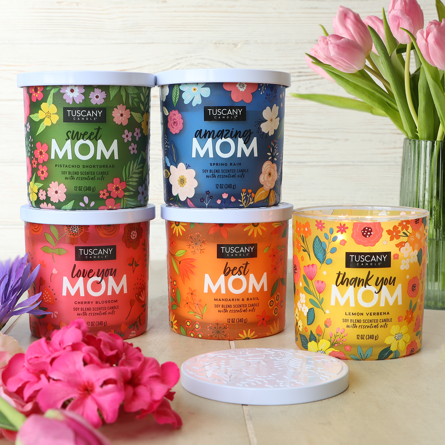 The "Thank You Mom: Lemon Verbena Scented Candle" by Tuscany Candle® SEASONAL is a perfect Mother's Day gift. This 12 oz soy blend candle, emitting a gentle citrusy fragrance, creates a delightful ambiance to celebrate the special women in your life.