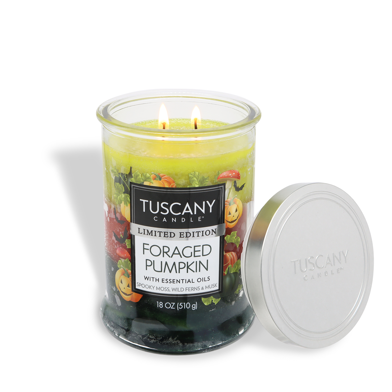 The Tuscany Candle® SEASONAL Foraged Pumpkin: Oakmoss & Dark Blooms Scented Halloween Candle (18 oz) features two glowing wicks and a side-set metal lid—an inviting autumn fragrance perfect for cozy nights.