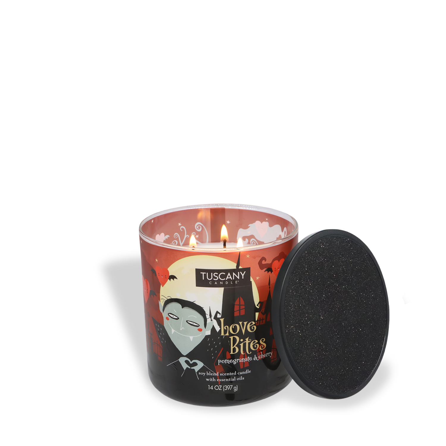 An open Tuscany Candle® SEASONAL "Love Bites: Tart Cherry & Crushed Pomegranate," 14 oz from the Mysteriously Spooky Collection, with a lit wick and black glittery lid resting beside it.