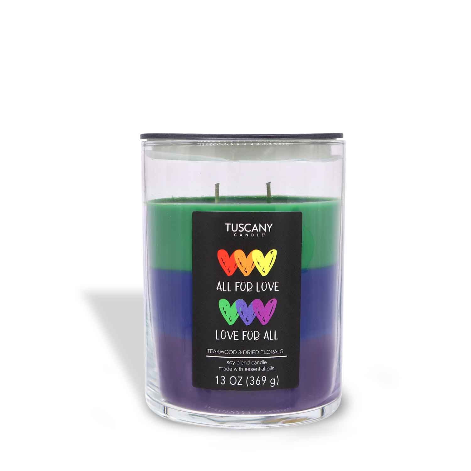 A All For Love Scented Jar Candle (13 oz) from the Tuscany Candle® SEASONAL Pride Collection with the words "all you need is love".