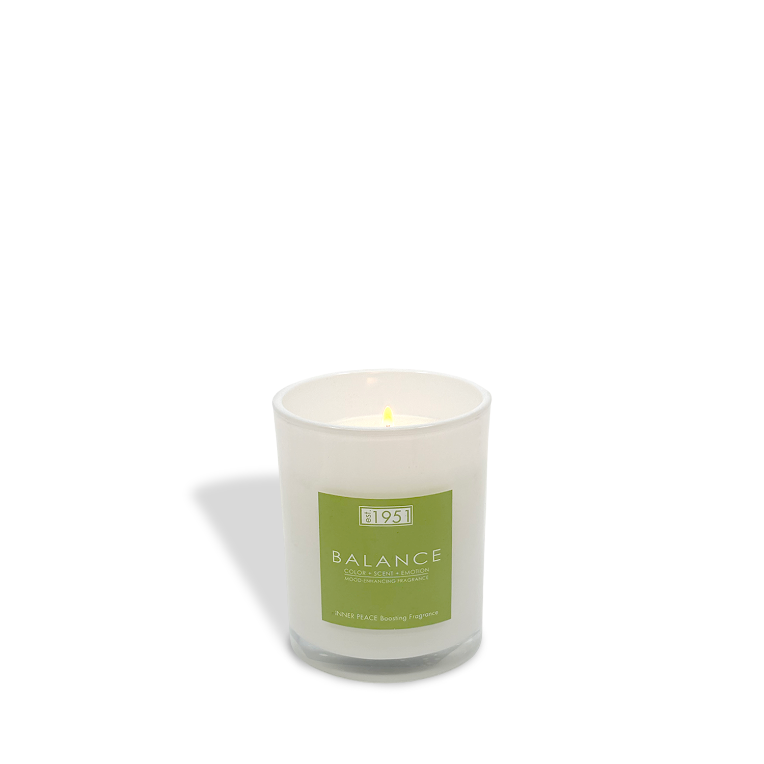 The est.1951 Balance (8oz) candle features a calming white wax in a clear glass holder with a green label, offering a soothing fragrance to enhance any space.