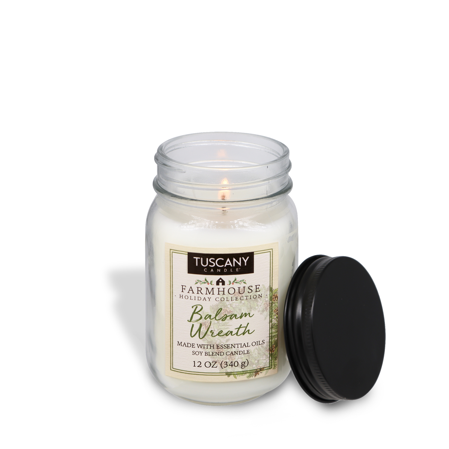 Balsam Wreath scented candle from the Farmhouse Christmas collection, poured in a mason jar with a matte black lid against a white background.