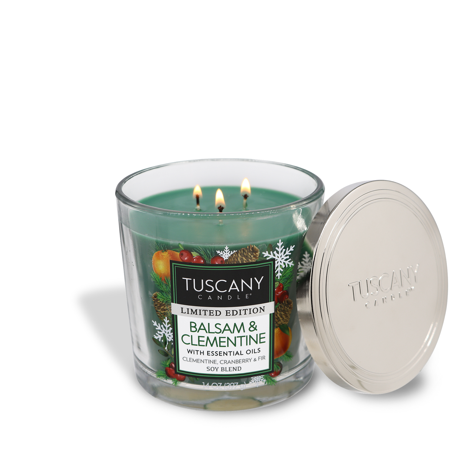 14oz Balsam & Clementine scented candle in a short clear glass jar with a silver lid, filled with pine green wax and three lead-free wicks, radiating fragrances of citrus, sweetened cranberry, and winter fir, ideal for festive winter moments.