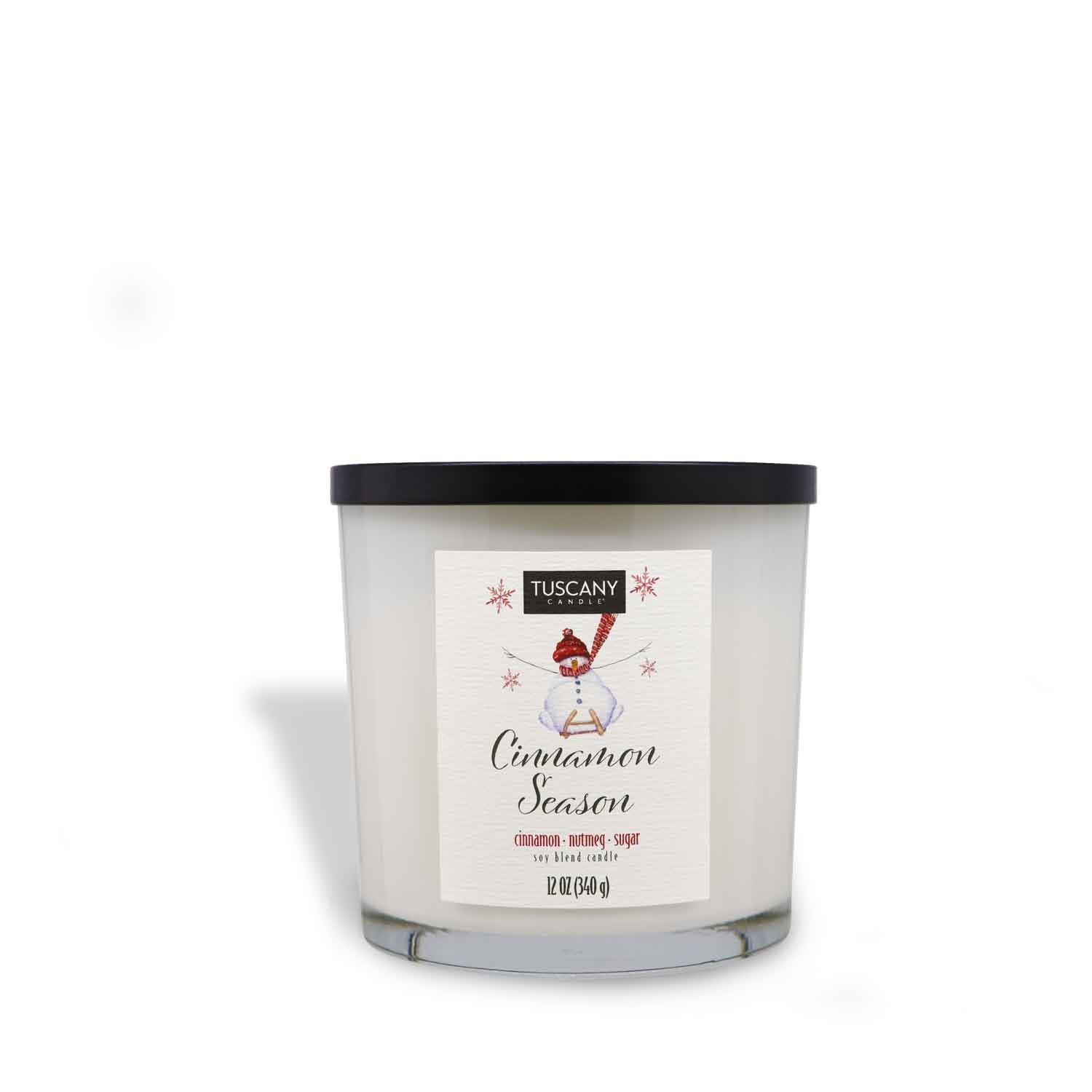 12oz Cinnamon Season scented candle in a glossy white glass jar with a black lid, filled with white wax, exuding the warm aromas of cinnamon, nutmeg, and clove from the Winter candle collection.