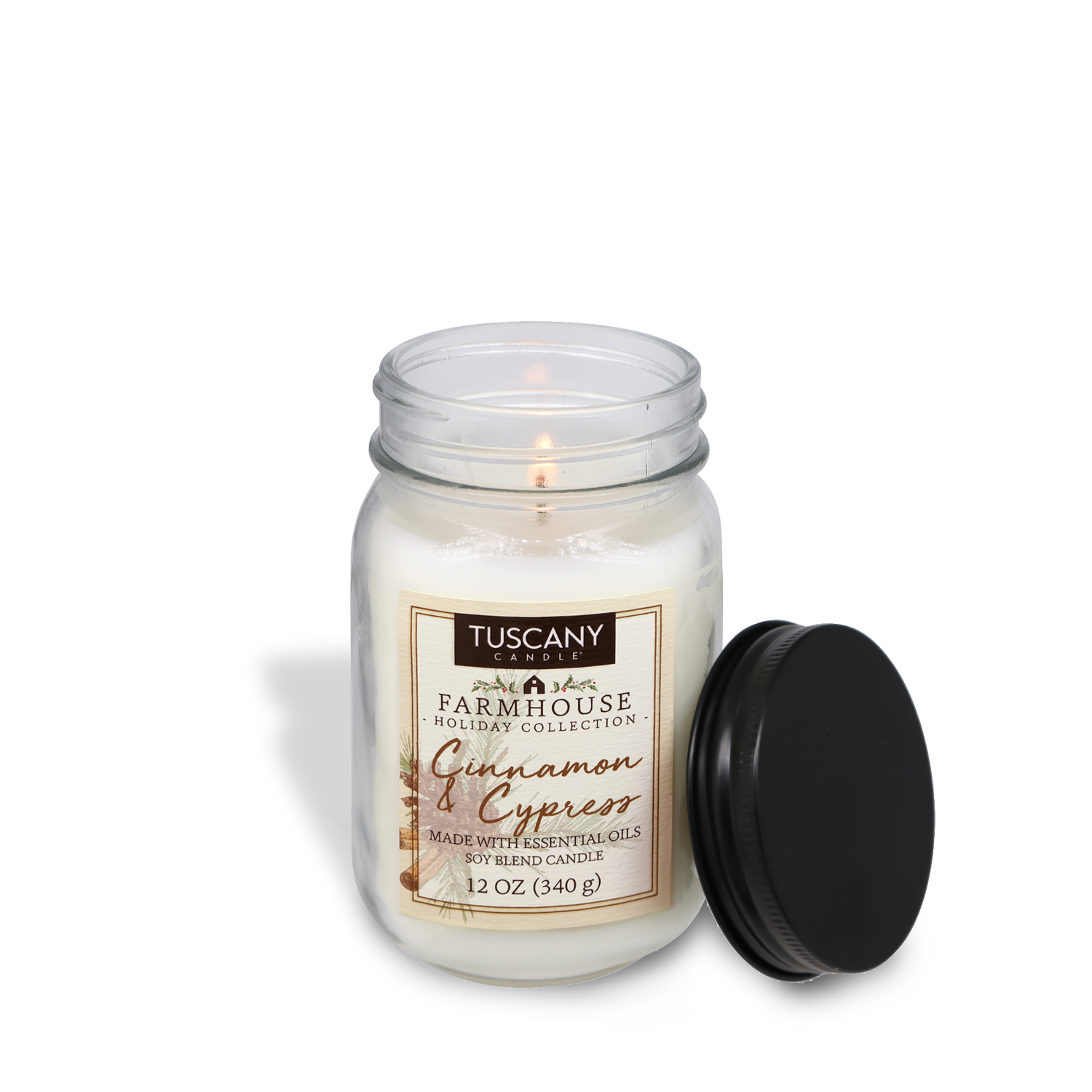 Cinnamon & Cypress scented candle from the Farmhouse Christmas collection, showcased in a mason jar with a matte black lid against a white backdrop