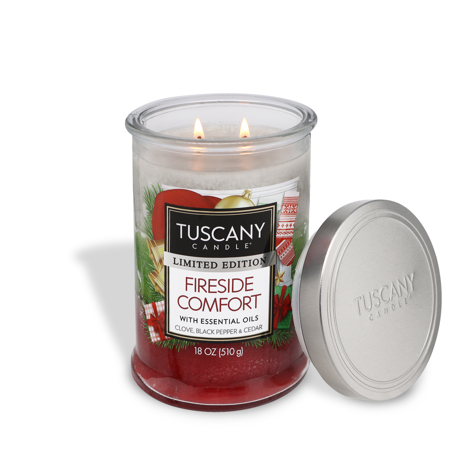Fireside Comfort scented candle from the Christmas collection, infused with essential oils of Cedar, Black Pepper, and Clove. The lid is removed, revealing three colors of wax, and both wicks are lit.