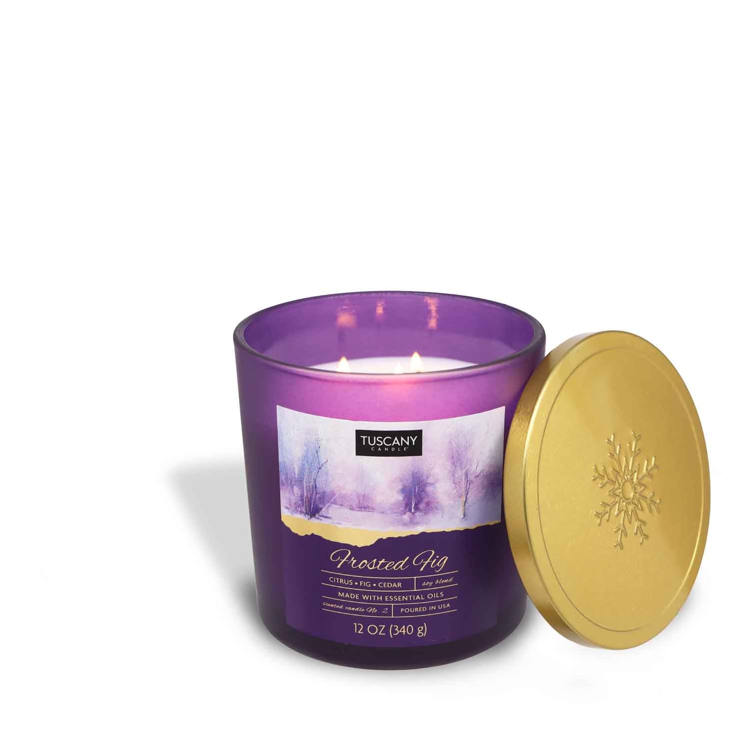 12oz Amber Fig scented candle in a painted glass jar with a golden lid, filled with white wax, exuding notes of amber fig, cool citrus, and warm cedar from the Winter candle collection.