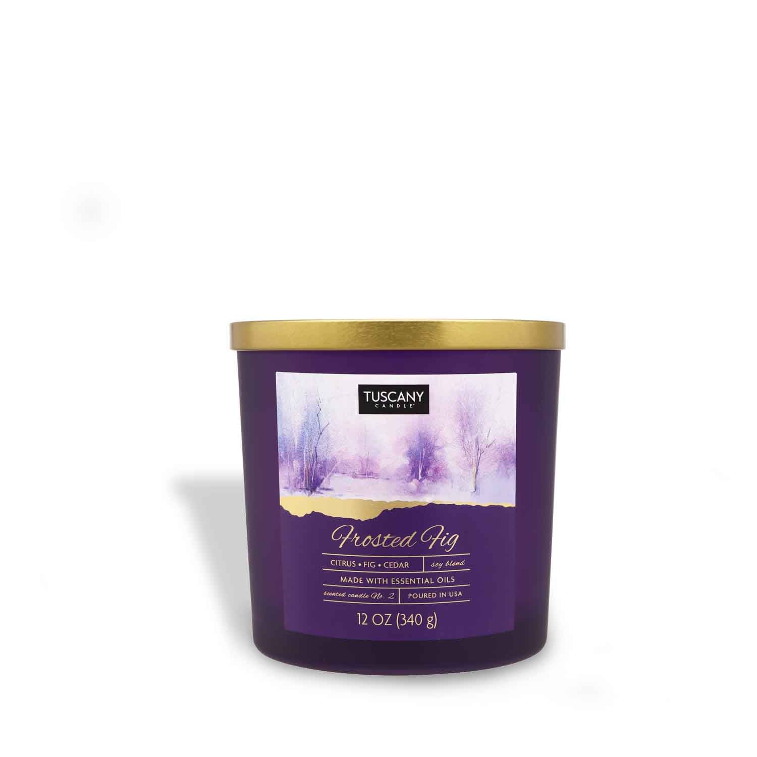 12oz Amber Fig scented candle in a painted glass jar with a golden lid, filled with white wax, exuding notes of amber fig, cool citrus, and warm cedar from the Winter candle collection.
