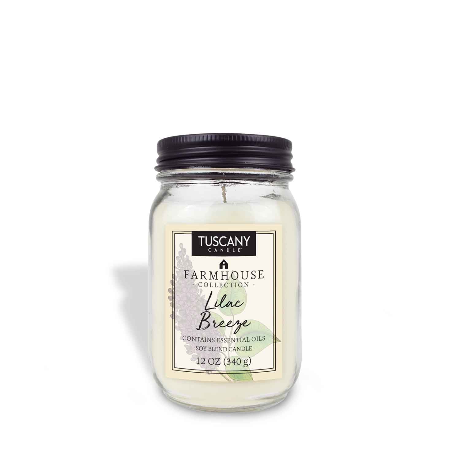 A Lilac Breeze Scented Jar Candle (12 oz) from the Farmhouse Collection by Tuscany Candle® EVD with a white candle.