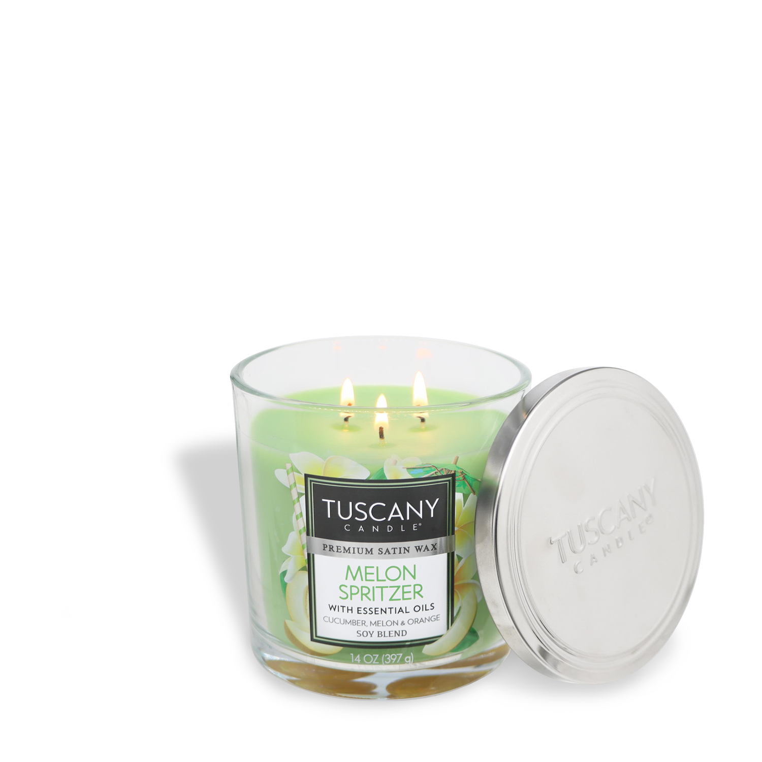 A lit green candle in a glass jar labeled "Melon Spritzer Long-Lasting Scented Jar Candle (14 oz)" by Tuscany Candle® EVD, with the lid placed beside it.