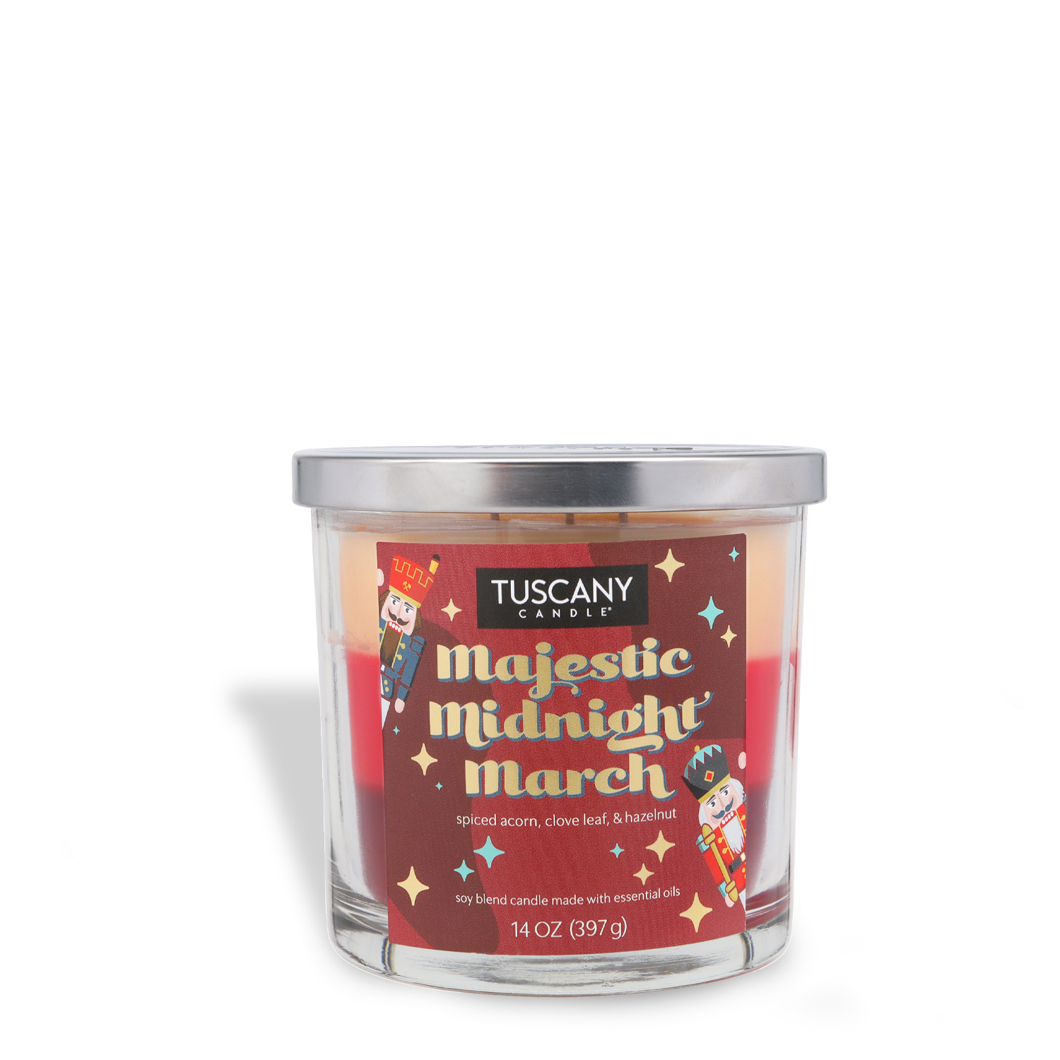 A 14 oz Tuscany Candle® SEASONAL "Majestic Midnight March" holiday candle with nutcracker graphics, featuring spiced acorn, clove leaf, and hazelnut scent, in a clear glass jar with a silver lid.