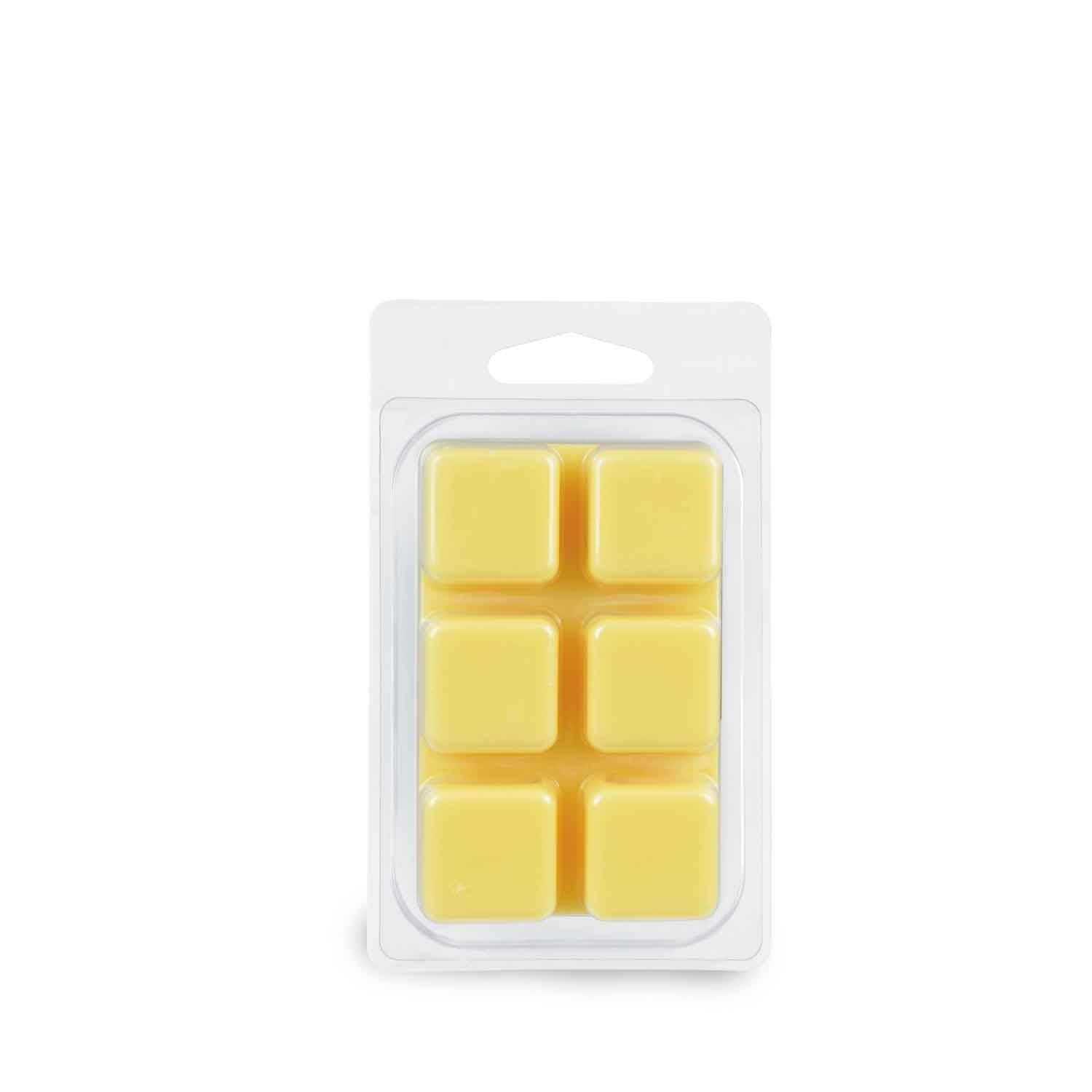 A pack of Pineapple Ginger scented wax cubes on a white background by Tuscany Candle®.