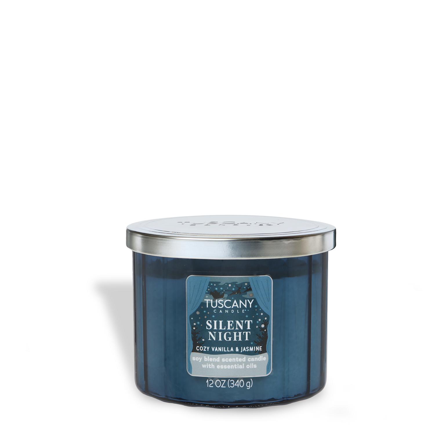 A blue glass Tuscany Candle® SEASONAL from the Winter Icons Collection, "Silent Night: Cozy Vanilla & Jasmine," 12 oz with a silver lid.