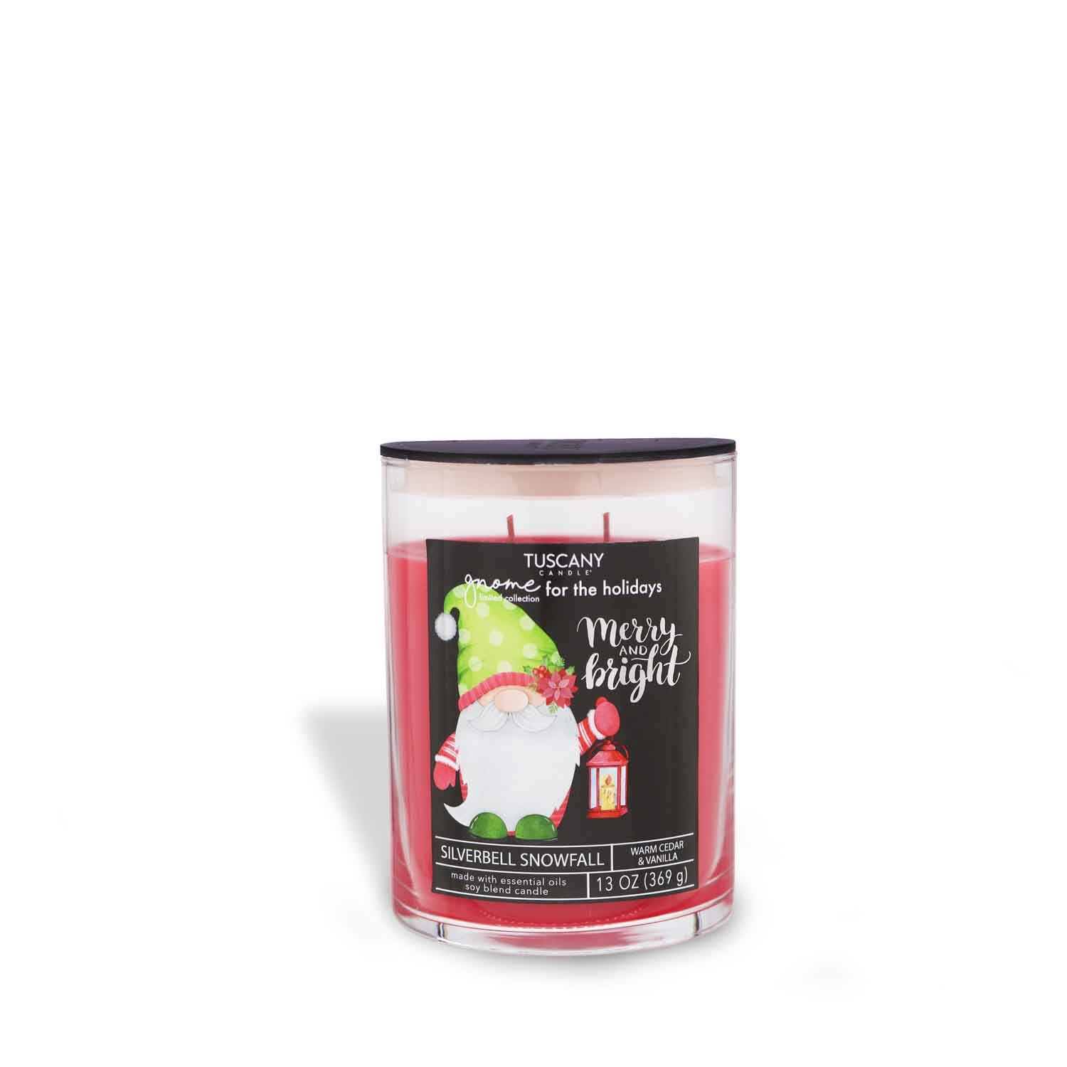 Party-ready Silverbell Snowfall candle from the Gnome for the Holidays collection, showing off its bright red wax and mischievously fun gnome label, all jazzed up against a white backdrop.