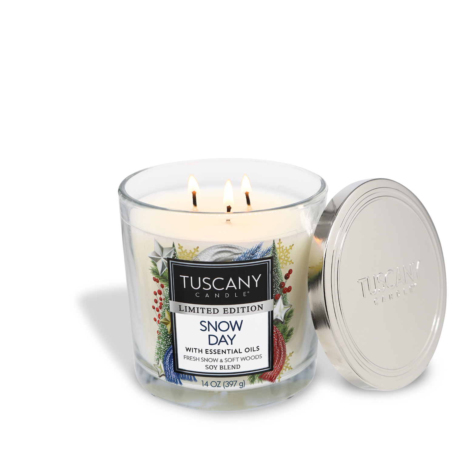 14oz Snow Day scented candle in a glass jar with a silver lid, made from white wax and emanating the aroma of fresh snow atop an evergreen tree from the Christmas candle collection