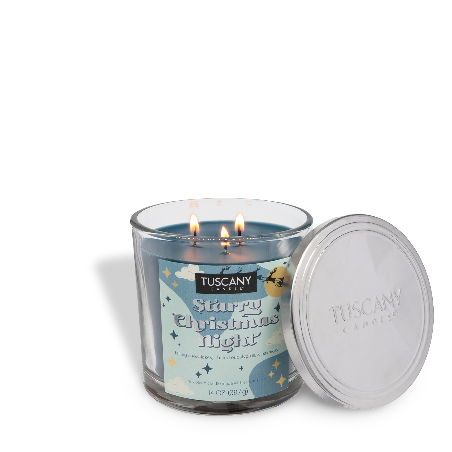 A Tuscany Candle® SEASONAL Starry Christmas Night Scented Holiday Candle (14 oz) with blue wax and three wicks in a glass jar, shown beside its clear lid.