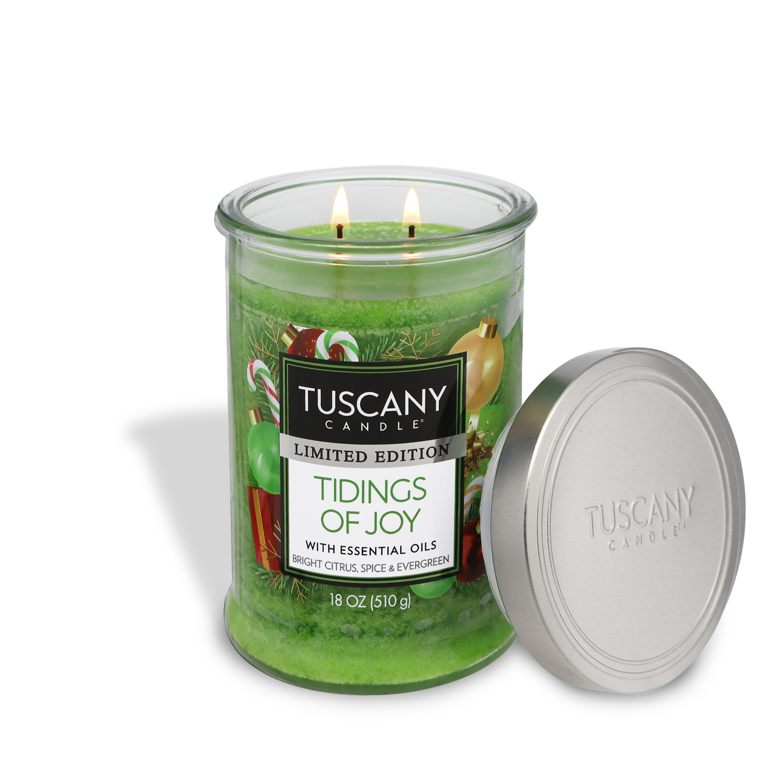18oz Tidings of Joy candle in a clear glass jar with a silver lid, showcasing bright green marbled wax and two lead-free wicks, emanating notes of effervescent citrus, evergreen needles, and spice, ideal for holiday and winter celebrations.