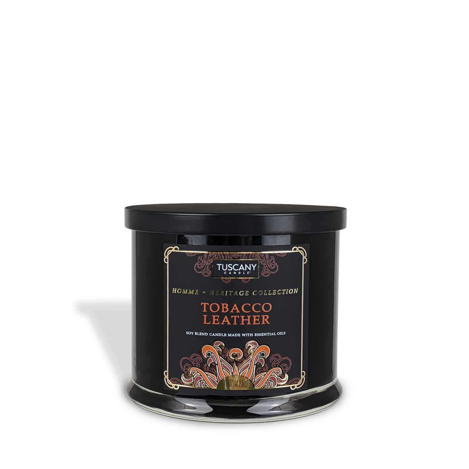 A vintage Tuscany Candle Tobacco Leather Scented Jar Candle (15 oz) – Homme + Heritage Collection tin.