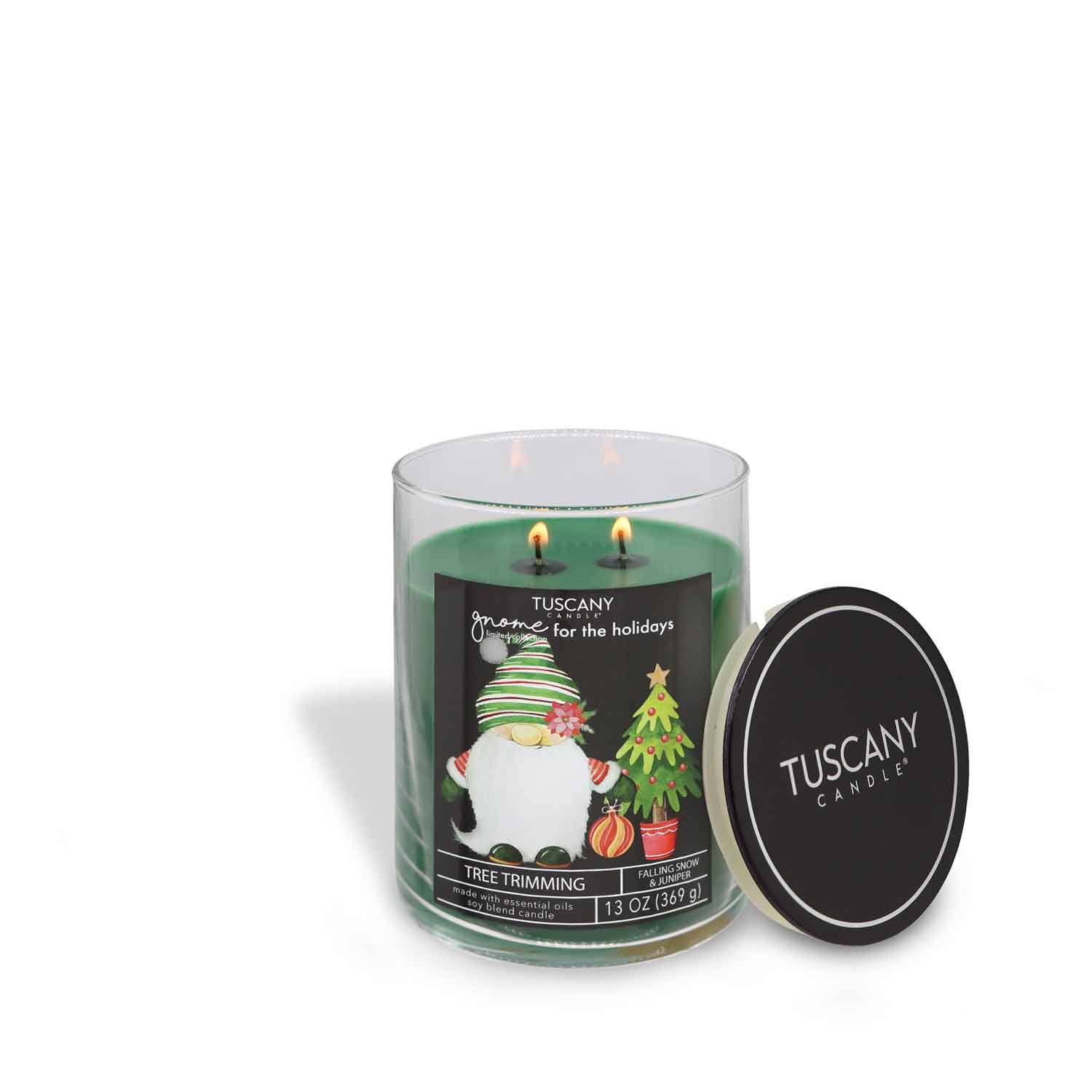 Tree Trimming candle from the Gnome for the Holidays collection, boasting vibrant green wax and a merry gnome-packed label, gleaming merrily against a snowy white background
