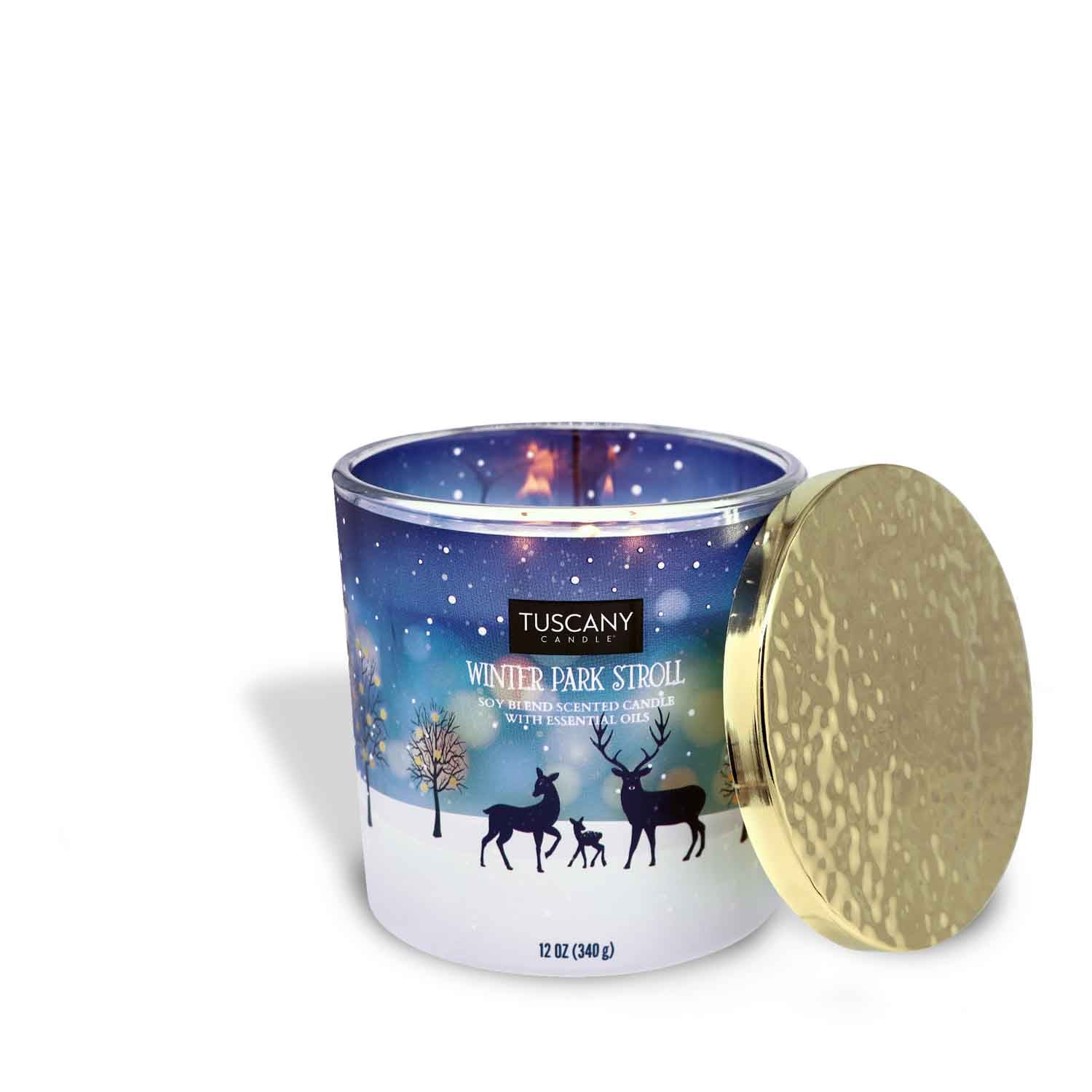 Winter Park Stroll scented candle from the Christmas collection, in a decorative glass jar with a golden lid, presented against a white background