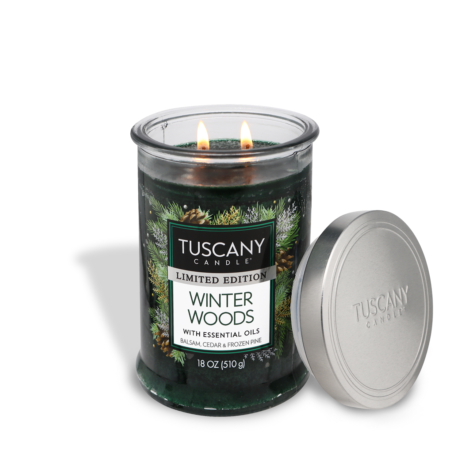 18oz Winter Woods candle in a clear glass jar with a silver lid, revealing deep green marbled wax and two lead-free wicks, exuding scents of winter balsam, cedar wood, and frozen pine needles, capturing the essence of festive winter forests