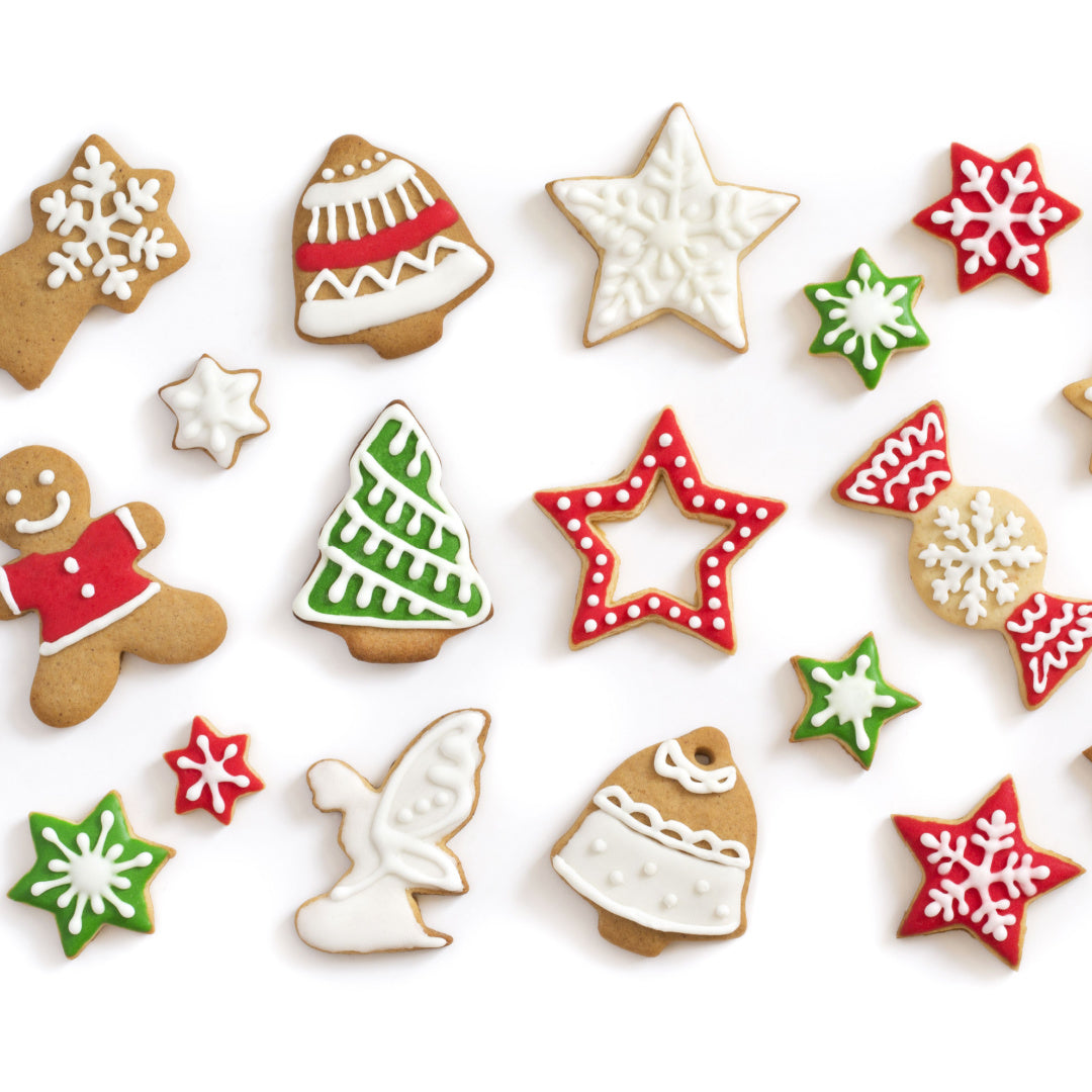 An array of frosted Christmas cookies - these are the inspiration for this scented Christmas candle
