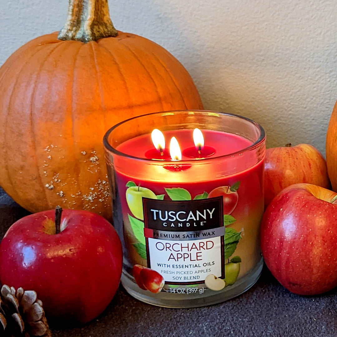 Tuscany Candle® EVD Orchard Apple Long-Lasting Scented Jar Candle (14 oz) is a scented candle that captures the essence of an apple orchard in Tuscany. The refreshing fragrance of juicy apples fills the air, creating a serene ambiance.