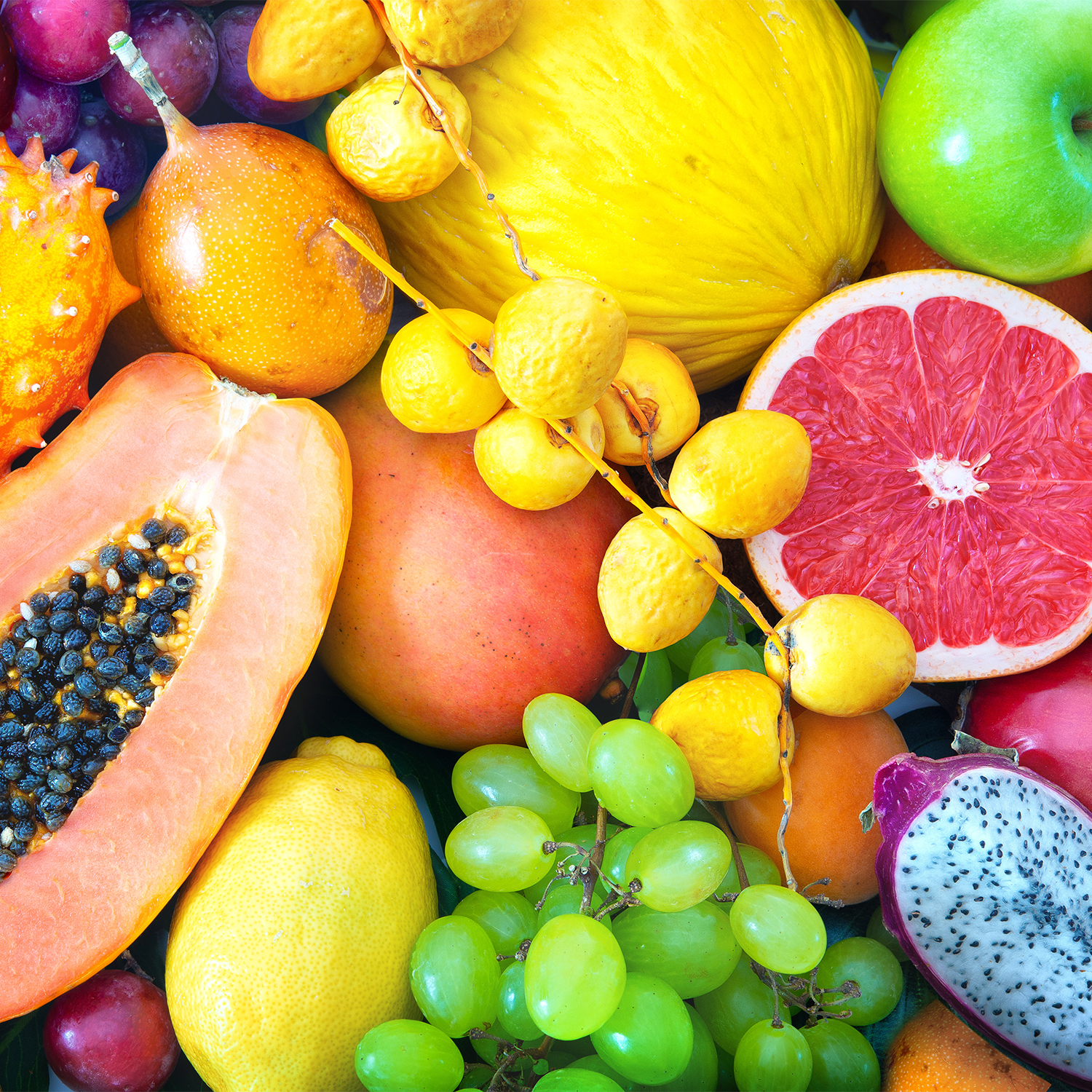 A photo of a bunch of different tropical fruits - these are the fragrances blended into the fresh-smelling "Island Nectar" scented candle from Tuscany Candle