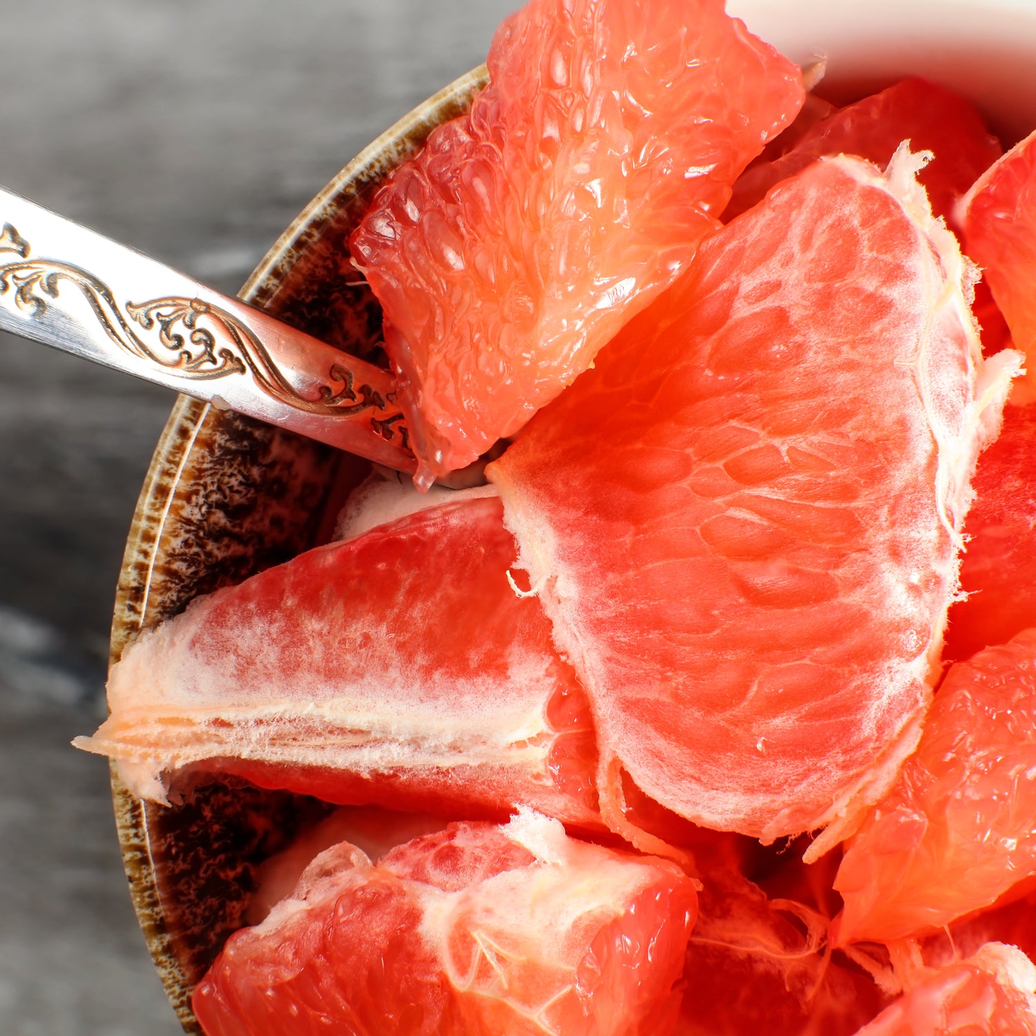 Pink grapefruit - inspiration for Pink Grapefruit, a mal odor control scented candle from Tuscany' Candle's Serene Clean® collection of scented candles and fragrance bars