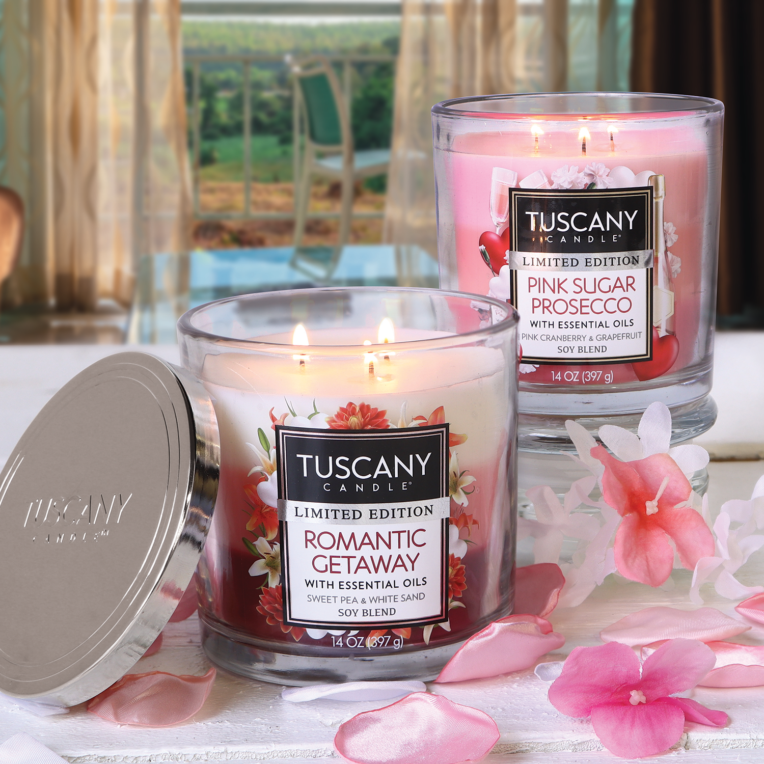 A stunning arrangement of Tuscany Candle® SEASONAL Romantic Getaway Long-Lasting Scented Jar Candles (14 oz) illuminating a table.